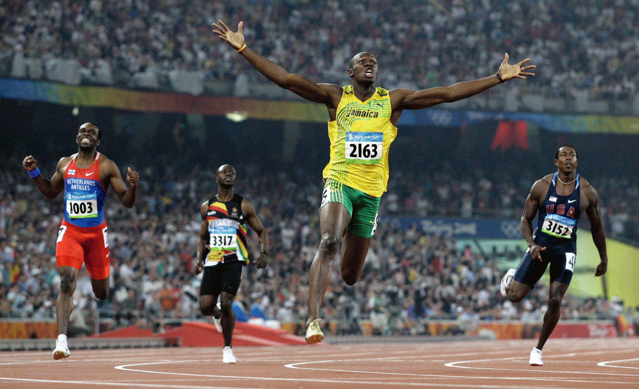 Anja Niedringhaus, An vorderster Front, Ausstellung, Kunstausstellung, Oberhausen, Ludwiggalerie Schloss Oberhausen, Usain Bolt gewinnt bei Olympia die Goldmedaille im 200 Meter Lauf, Peking, picture alliance AP